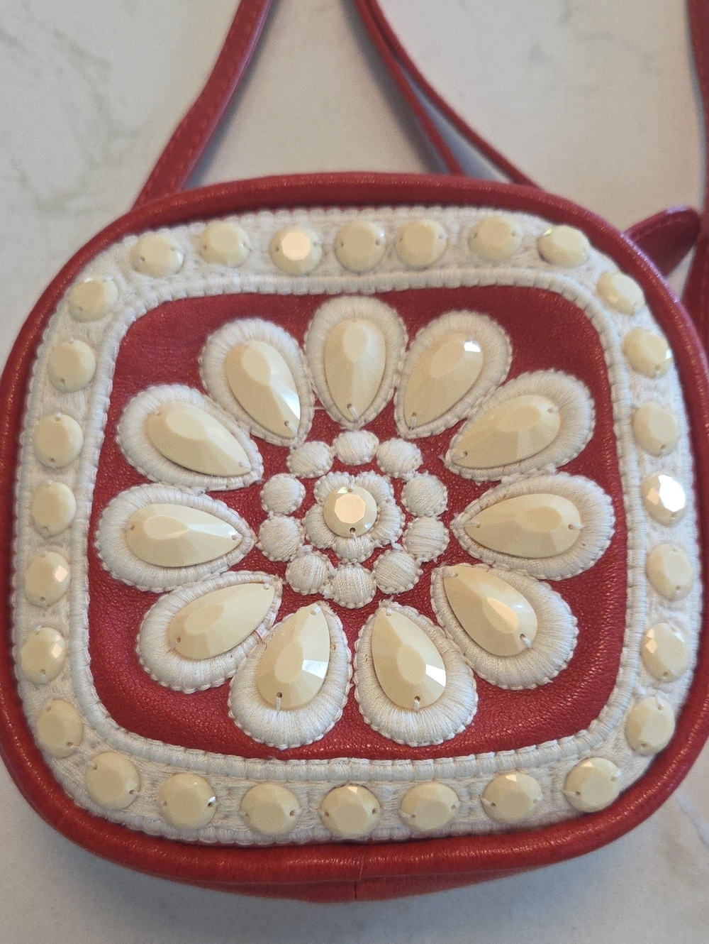 Red Embellished Leather Crossbody Bag with Cream Beaded Flower Brighton